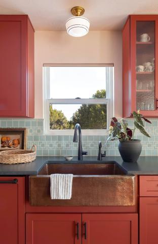 light blue backsplash red cabinets
