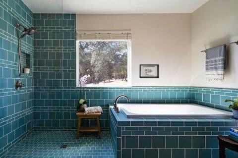 blue tile design in bathroom