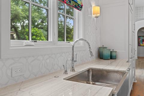 swirling pattern tile backsplash