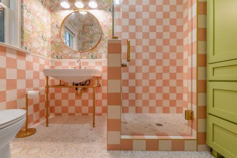 coral and white square tile bathroom