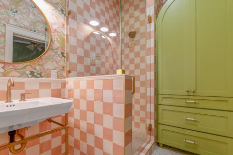 coral and white square tile bathroom