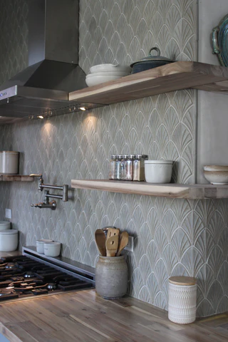 shell patterned kitchen backsplash
