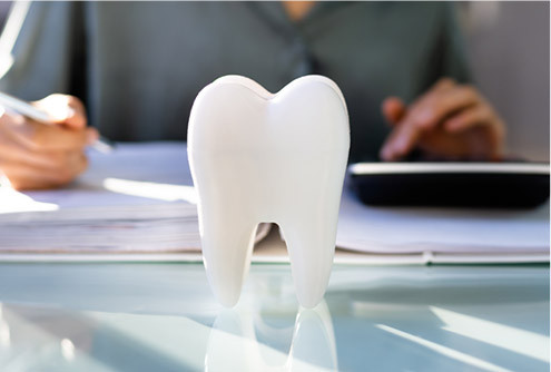 giant tooth on desk