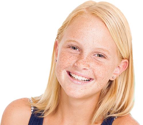 Teen girl with blonde hair and freckles smiling.