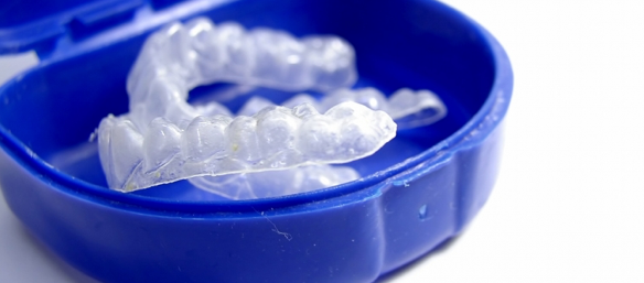 invisalign dental aligners in a blue case